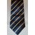 Sötétkék alapon krémszínű és fekete csíkos selyem nyakkendő